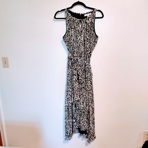 NWT Vince Camuto Cheetah B leopard printed dress. Asymmetric hem with keyboard c